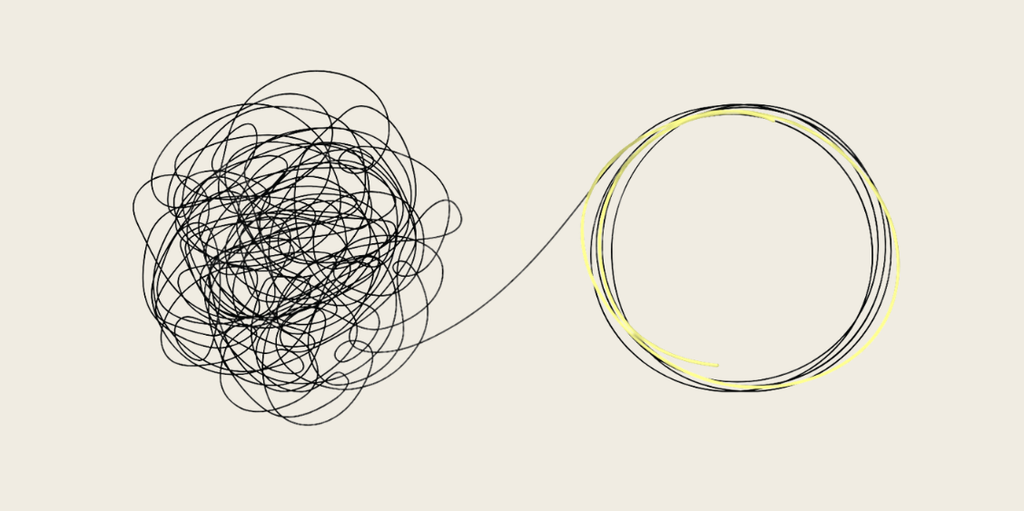 A tangled scribble resolving into a single clear circle